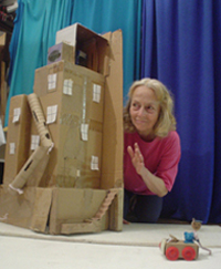 Penny Jones and found-object set for Shoe Box Puppet Shows