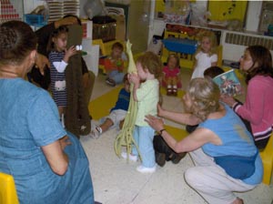 Penny Jones directs student puppets for Shoe Box Puppet Shows